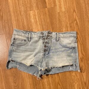Free people distressed mid rise denim shorts light wash